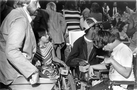 Wheelchair users inside building